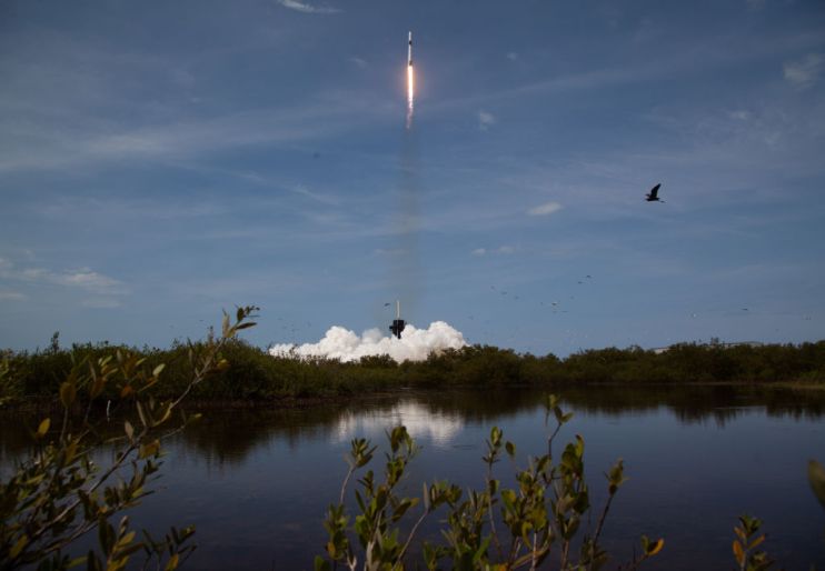 The first US space mission since 2011 has reached its destination, the International Space Station, NASA has confirmed.