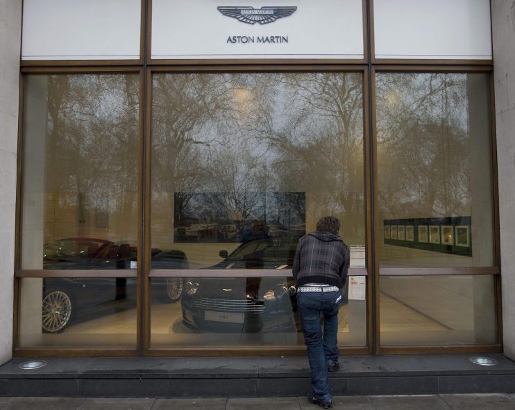 Luxury sports car maker Aston Martin has today announced it will cut 500 jobs as the iconic brand continues with its business-wide reset.