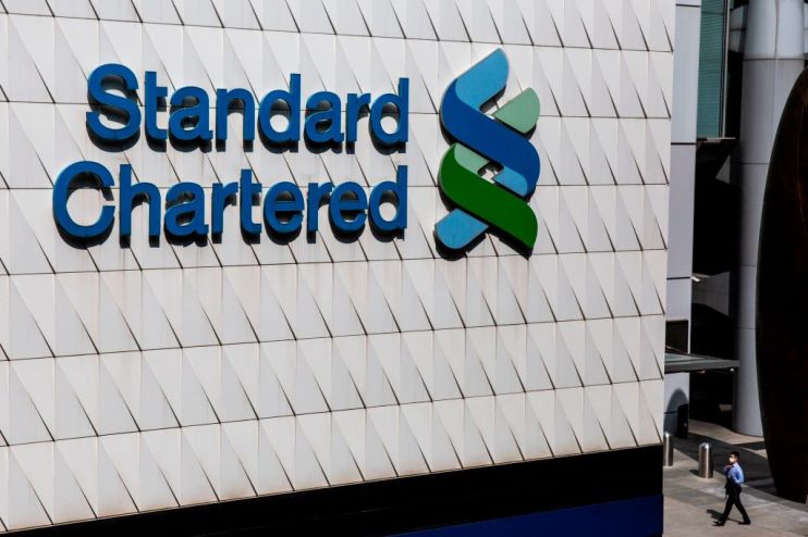 Standard Chartered profit slumps as credit impairments mount