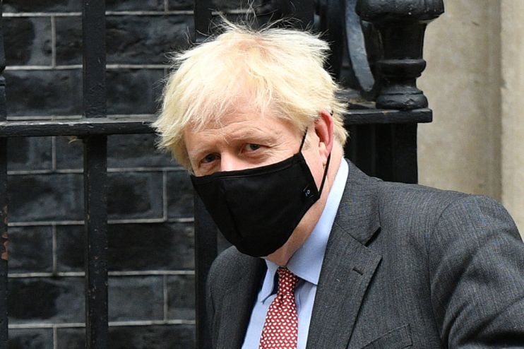 Boris Johnson Leaves Downing Street For PMQs
