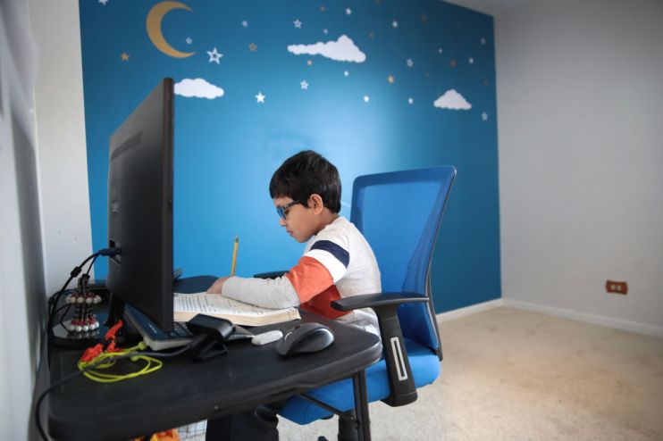 School Children Take Part In Remote Learning During Coronavirus Pandemic