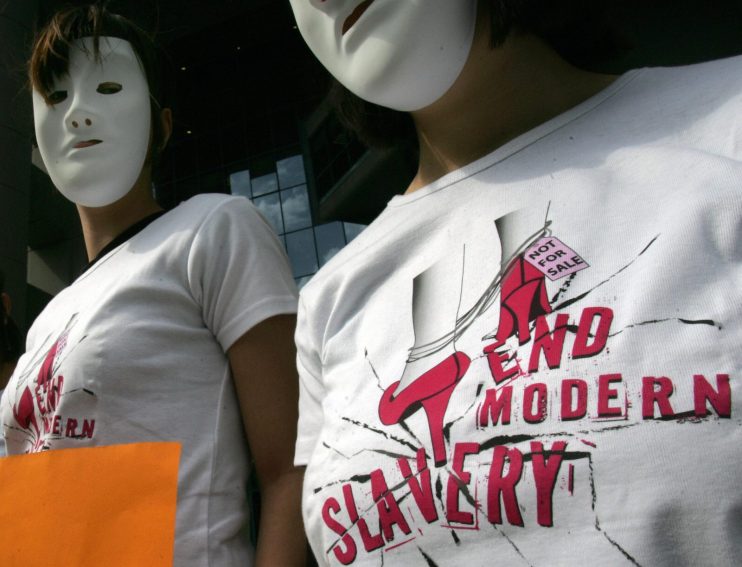 Amnesty International activists wearing