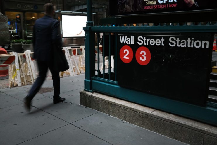 US stocks hit all-time high but economic fears knock FTSE 100