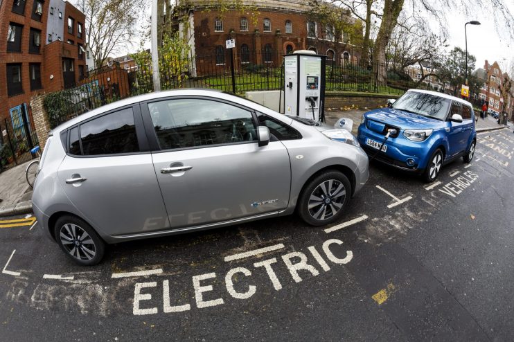 Go Ultra Low Electric Vehicle on charge on a London street