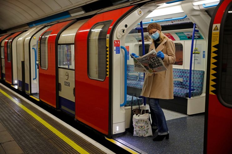 TOPSHOT-BRITAIN-HEALTH-VIRUS-TRANSPORT