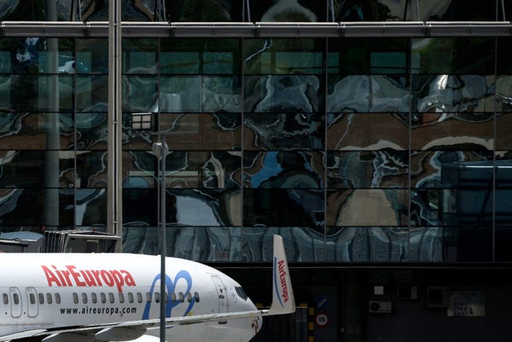 British Airways owner IAG has slashed the price of its purchase of Air Europa in half, the airlines group announced this morning.