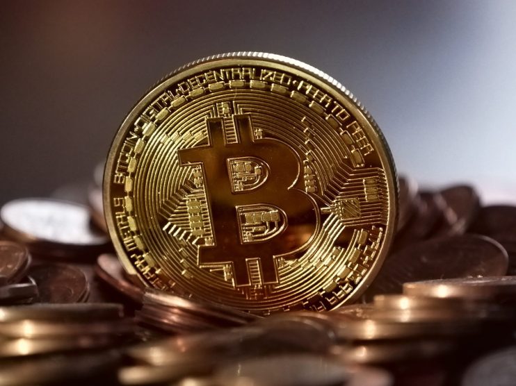 Gold has enjoyed a run as a safe haven asset while bitcoin production cuts are expected next month