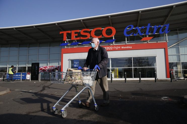 Tesco to repay &pound;585m in emergency support with Covid risks 'behind us'