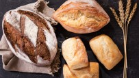 Artisan bread loaves on display, symbolizing Associated British Foods strategic merger challenge to Warburtons in the brea...