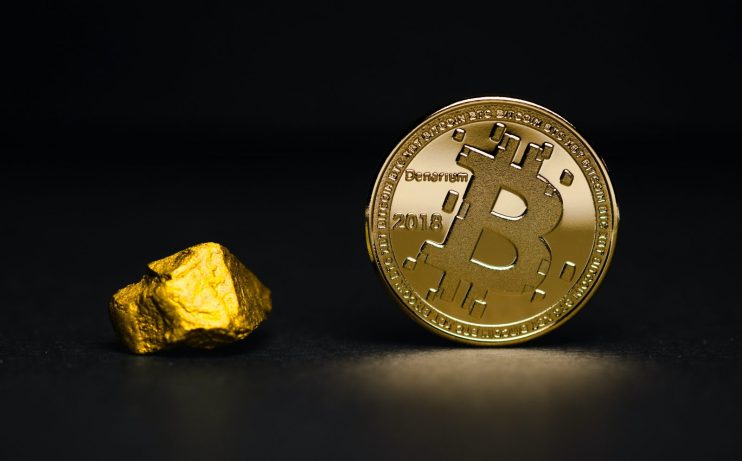 Bitcoin with gold - photo by Aleksi R&auml;is&auml; on Unsplash