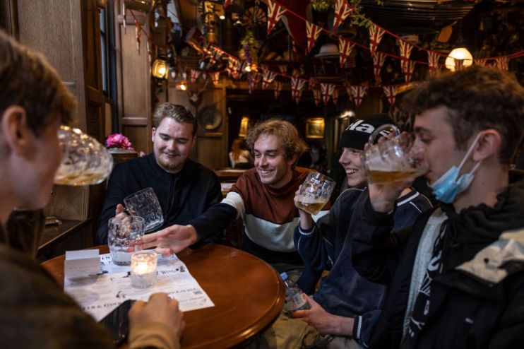 Brits heading out to Christmas parties helped drive spending in bars and pubs higher