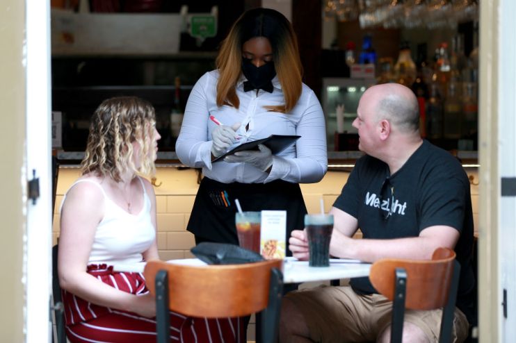 New Orleans French Quarter Restaurants And Businesses Start to Reopen With Social Distancing Practices in Place