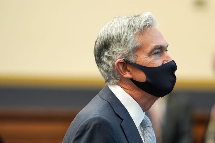 The Federal Reserve this evening indicated that its first post-pandemic interest rate hikes could come in 2023, sending Wall Street's markets down.