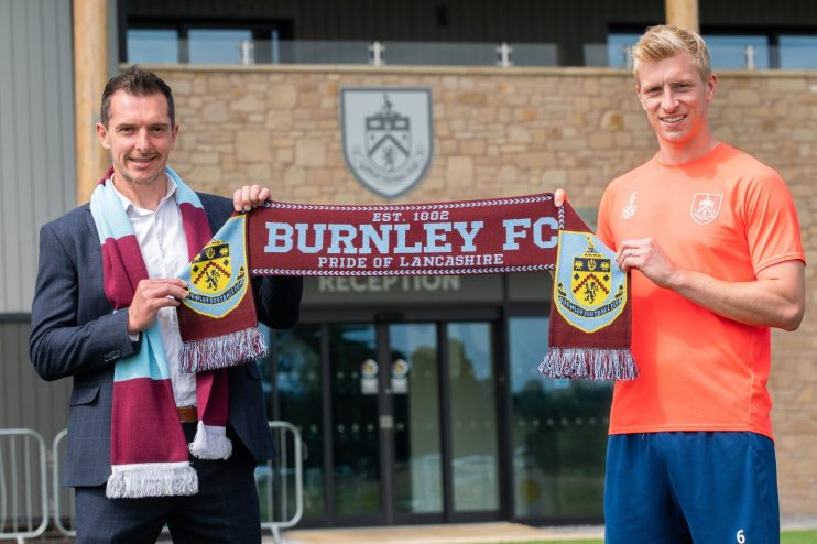 Spreadex, represented here by head of marketing Andy MacKenzie, and Burnley, whose captain Ben Mee is pictured, have agreed a one-year deal