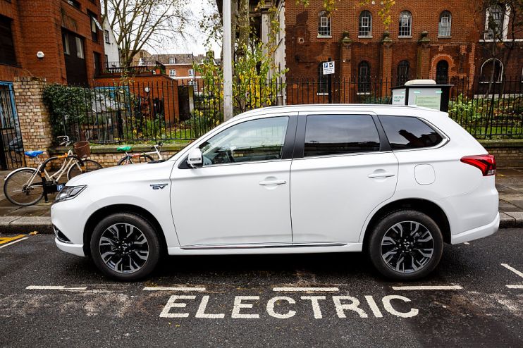 Go Ultra Low Electric Vehicle on charge on a London street