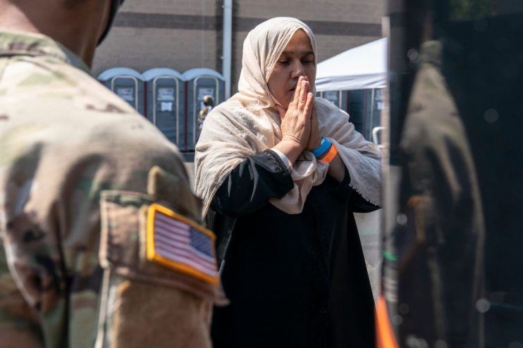 Afghan Refugees Arrive To Be Processed At Dulles Expo Center