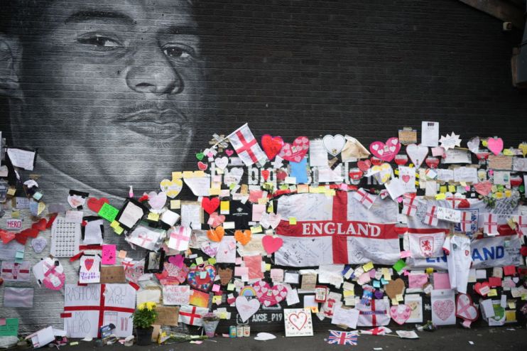 Defaced Mural Of Marcus Rashford Repaired By The Artist In Manchester