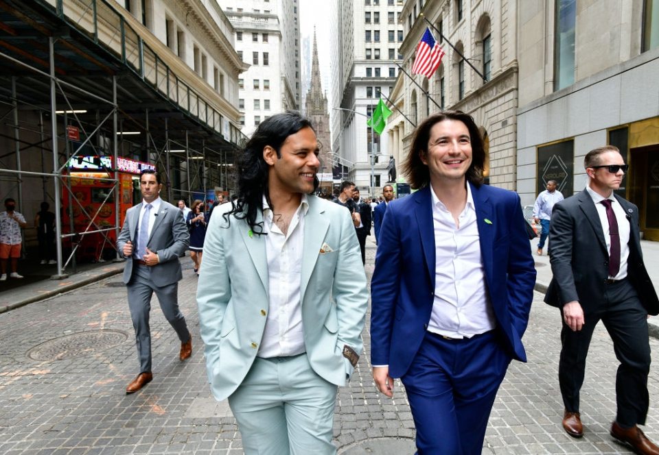  Robinhood co-founders Baiju Bhatt and Vlad Tenev walk on Wall Street 