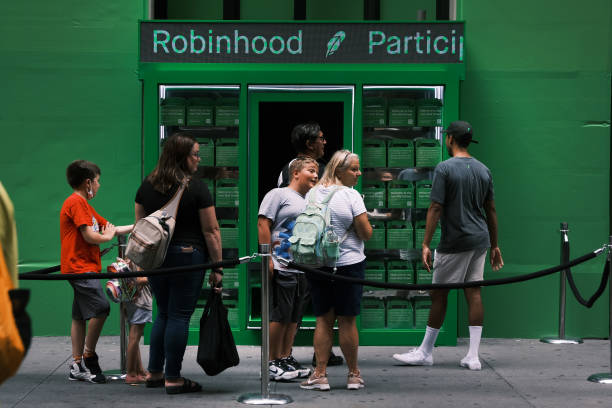 People queue up to purchase Robinhood merchandise