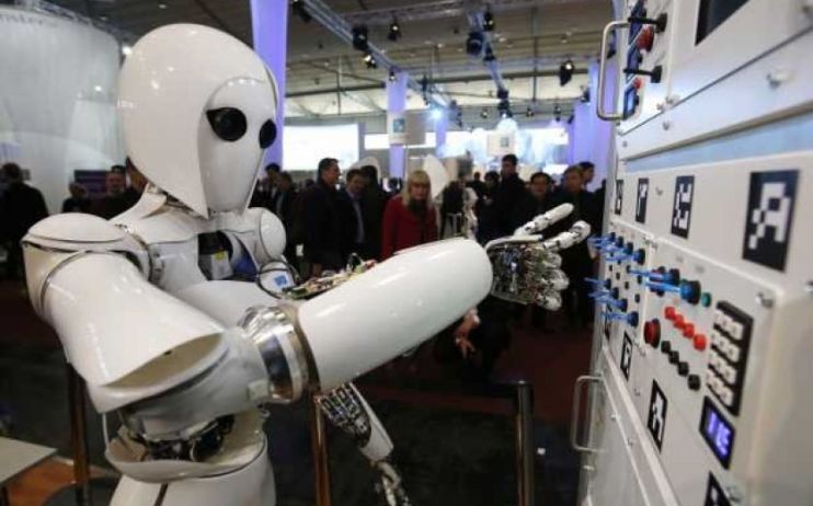 The British government will spend more than &pound;100m building artificial intelligence (AI) research hubs and preparing regulators.