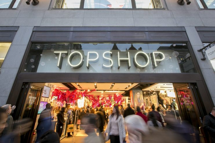 Christmas Shoppers Hunt For Gifts On The High Street