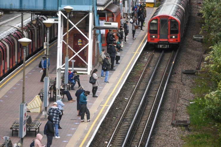 Boris Johnson has urged commuters not to crowd onto public transport as some workers began returning to their offices today.