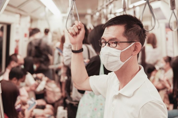 Asian man wearing face mask