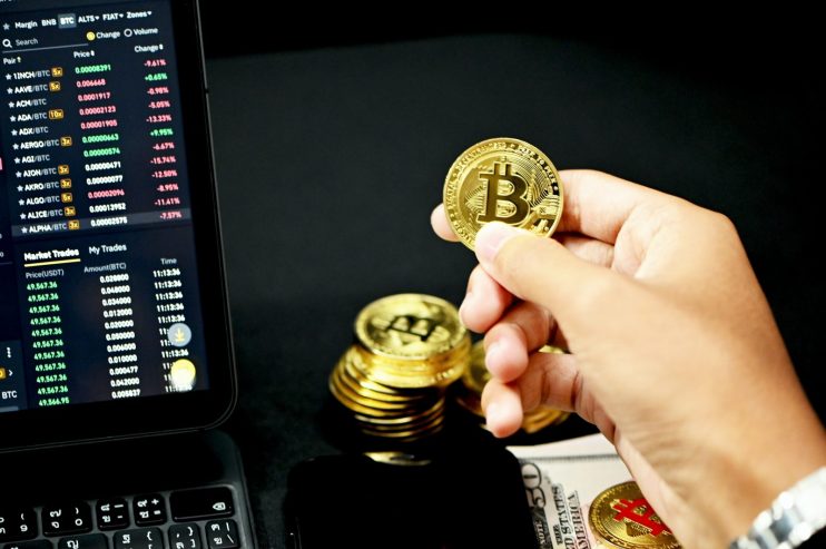 Bitcoin is set for a period of wild volatility before reaching record values by Christmas, experts believe.