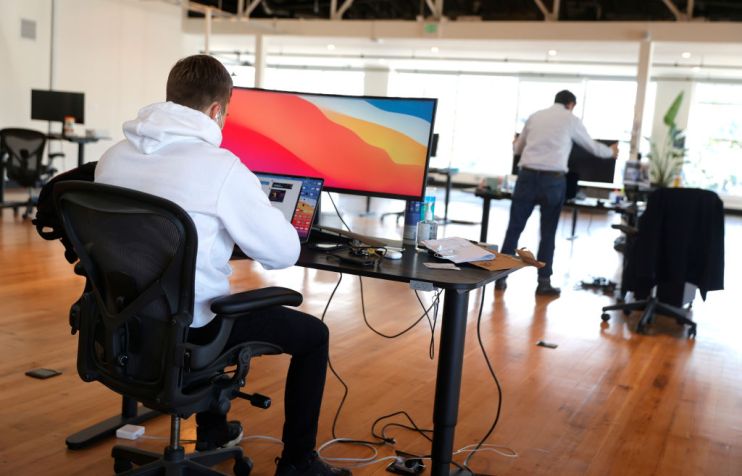 Employees Of San Francisco Startup Company Head Back To Work In Their Offices