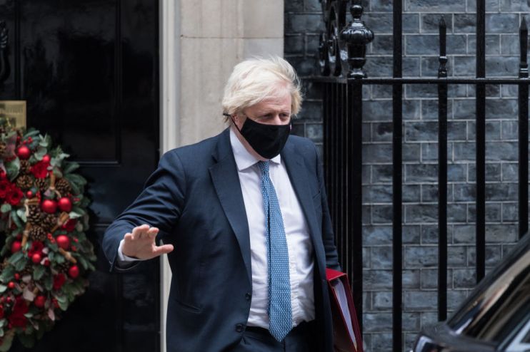 Boris Johnson Leaves Downing Street for PMQs