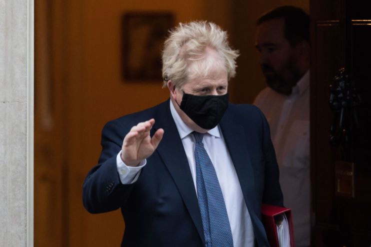 Boris Johnson Leaves Downing Street for PMQs