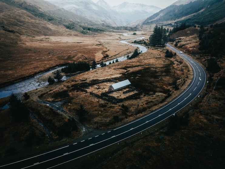 road landscape mountains water