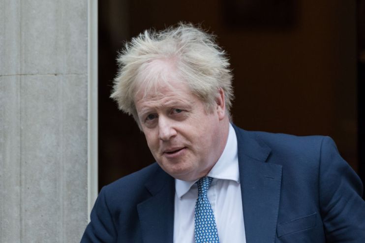 Boris Johnson Leaves Downing Street for PMQs