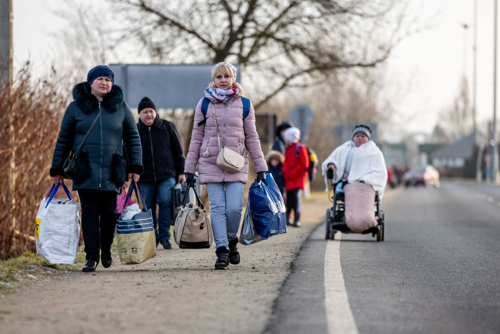 Ukrainians Flee To Hungary Amid Russia's Armed Invasion