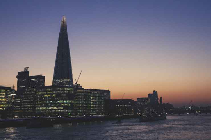 city dawn sunset water