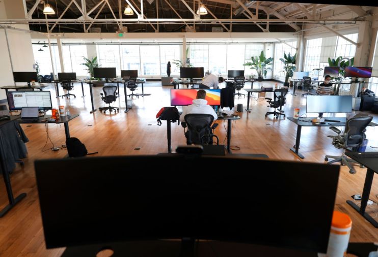 Employees Of San Francisco Startup Company Head Back To Work In Their Offices