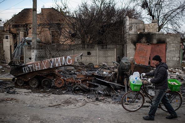 Russian Retreat From Bucha Reveals Scores Of Civilian Deaths