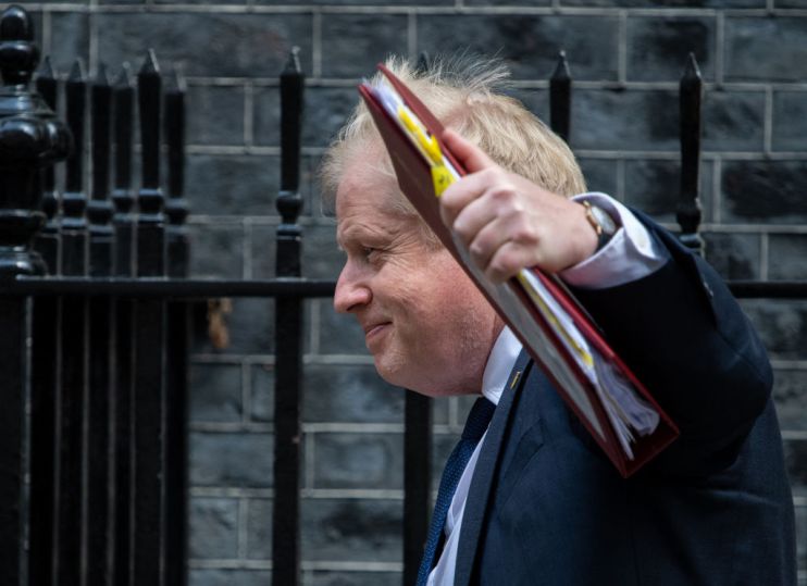 Boris Johnson Departs For PMQs As 'Partygate' Draws Opposition's Ire