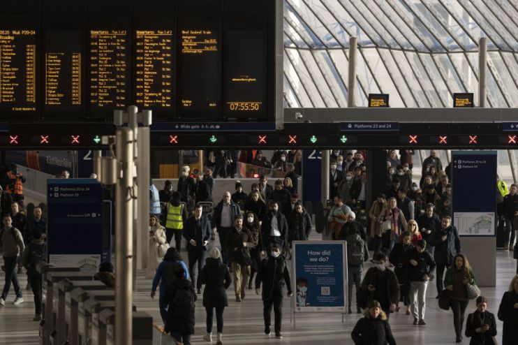 Commuters As U.K. Unemployment Drops Below Pre-Pandemic Level for First Time