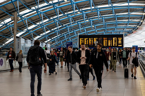 Commuters are in Waterloo Station