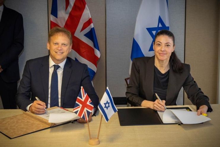 Grant Shapps with his Israeli counterpart signing a deal to advise on the building of Tel Aviv's metro.
