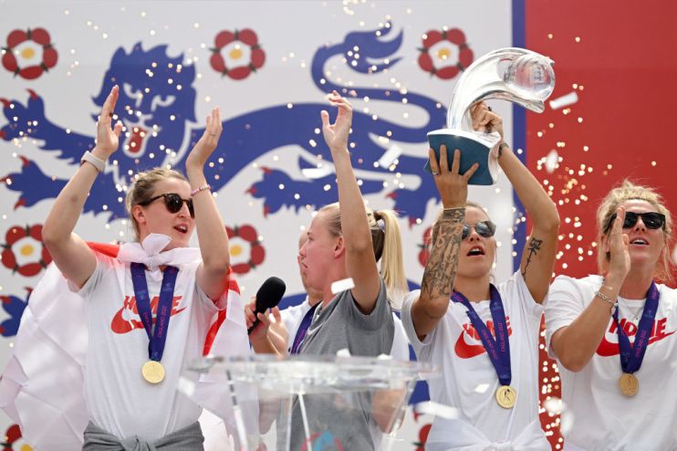 The Lionesses Lift The UEFA Women's Euro Trophy In Victory Celebration For Fans