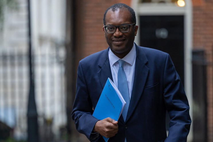 The Chancellor on his way to deliver the mini budget