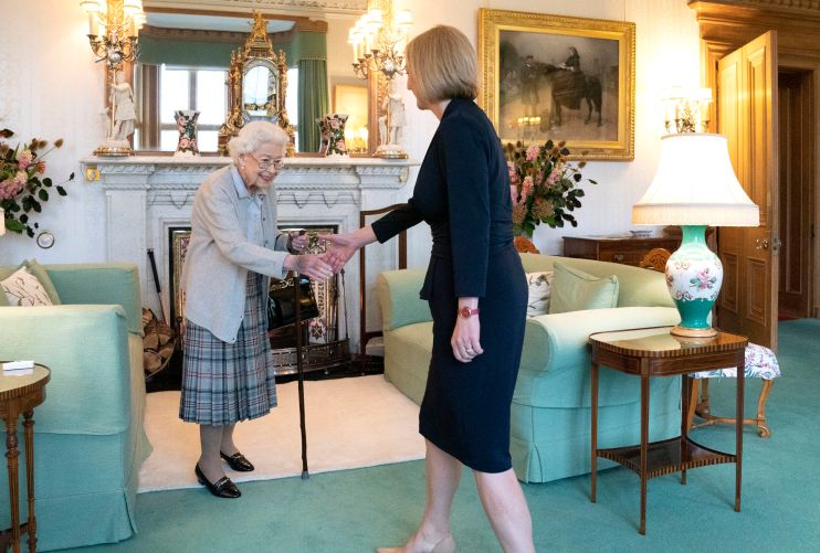 Queen Elizabeth greets newly elected leader of the Conservative party Liz Truss as she arrives at Balmoral Castle for an audience where she will be invited to become Prime Minister and form a new government (Photo by Jane Barlow &ndash; WPA Pool/Getty Images)