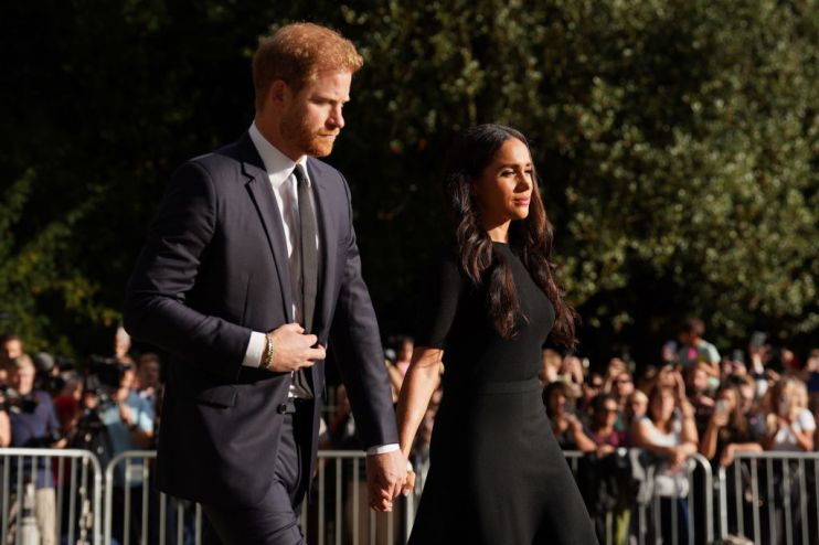 The Prince and Princess of Wales Accompanied By The Duke And Duchess Of Sussex Greet Wellwishers Outside Windsor Castle