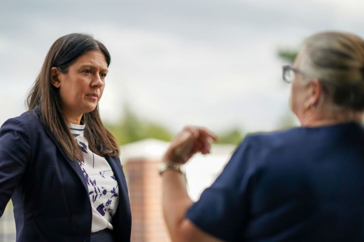 Lisa Nandy (L), Shadow Secretary of State for Levelling Up, Housing, Communities & Local Government meets a resident as she visits a housing development in Croxteth (Photo by Ian Forsyth/Getty Images)