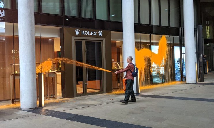 Just Stop Oil supporter vandalising the Knightsbridge Rolex store
