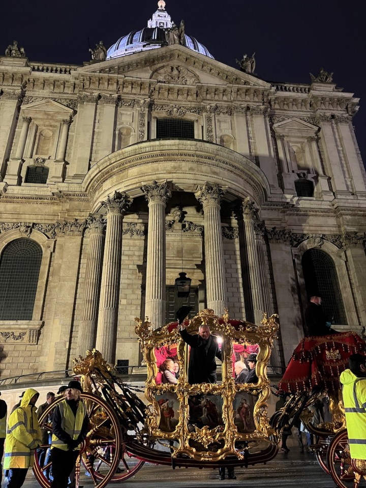 Horse-drawn golden state carriage in the heart of the City 