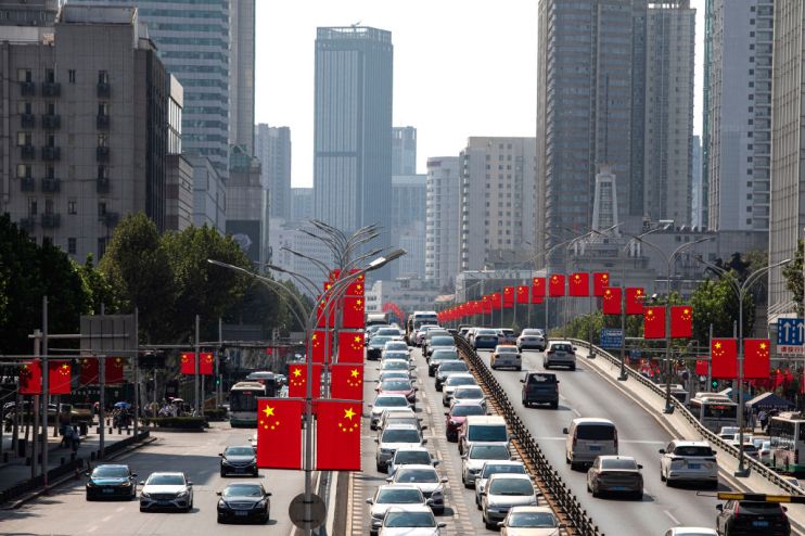 China will surpass its 5 per cent growth rate target, the country's central bank chief has said