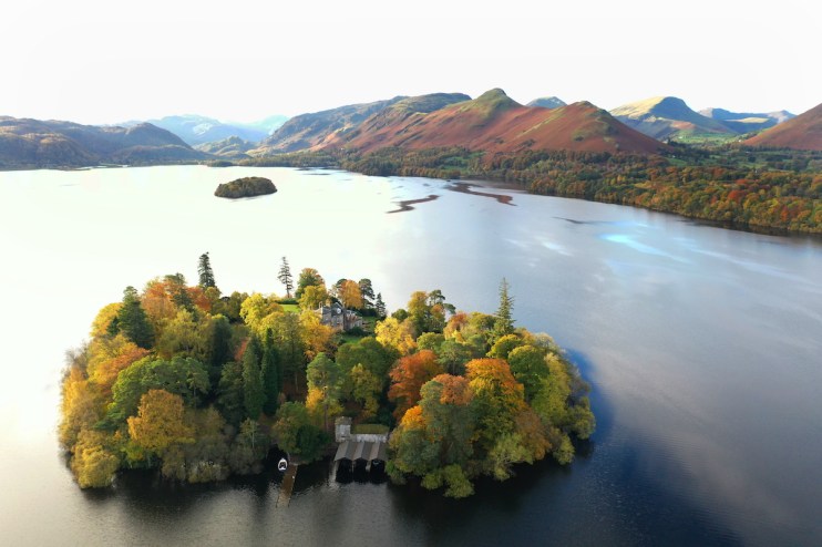 Autumn colours on Derwent island, Derwentwater near Keswick in the Lake District, Cumbria.